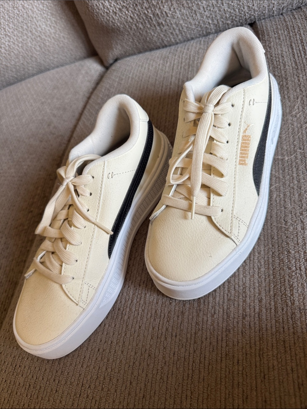 Puma Cream and Black Low-Top Sneakers
